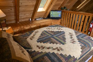Loft bedroom with windows and skylights to watch the stars