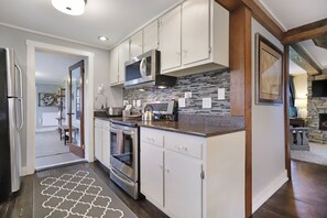 Kitchen with view into sunroom