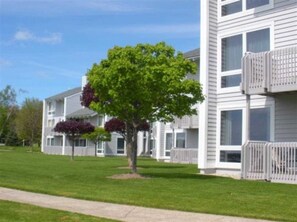 1st floor unit- walk out to pool and water