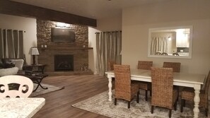Family Room with fireplace, TV and sectional sofa