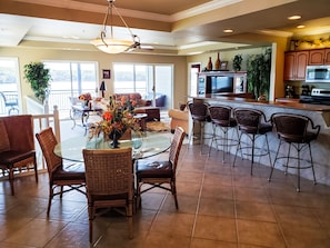 Seating for 6 at the dinning table and an additional 4 at the bar.