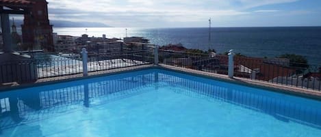 Pool and Southern portion of Banderas Bay and iconic church just steps away