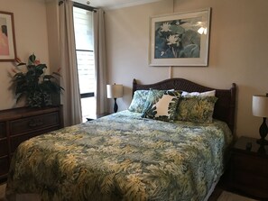 Bedroom with queen size bed. Blackout curtains for light sensitive people.