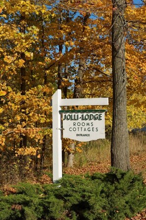 Welcome to the Jolli-Lodge!  Our sign on M-22 just south of Leland 