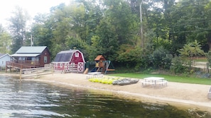 Sandy gentle-slope private beach is 80 ft long has tables; now w/ kayak racks.