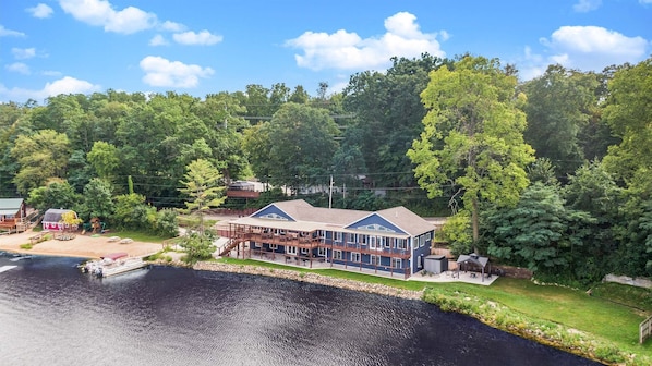 Covered Deck is 101 ft long; the gentle slope private sandy beach is 80 ft long.