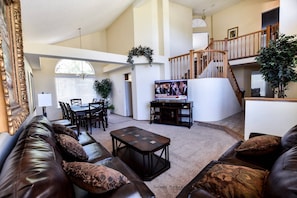 LIVINGROOM-DINING ROOM AND STAIRCASE TO SECOND FLOOR