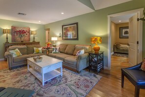Living room with view into office.
