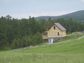 Surrounded by hills and forest