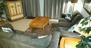 2 sleeper sofas can sleep 4. Hutch with t.v and dvds and Privacy blinds.