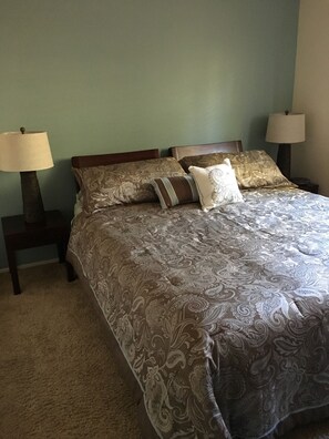 Master bedroom with King size bed. 