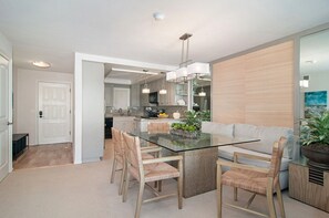 View from living room toward kitchen and entryway