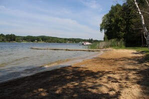 120 feet of sandy frontage on all sports Intermediate Lake!