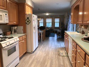 view from kitchen into dining and living room area