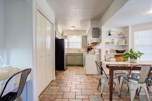 Cute kitchen to cook your meals in.