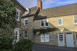 Here's the cottage.. The loft bedroom and bathroom have windows at the rear.