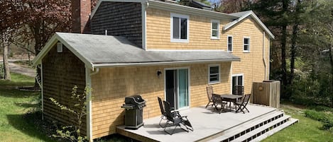 New Deck, perfect for relaxing.  Home is backed by a dry vernal pool-beech trees