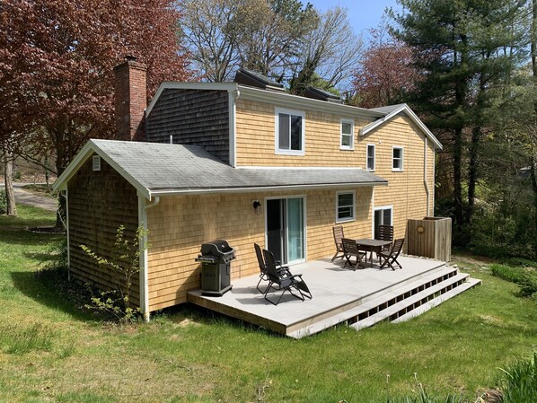 New Deck, perfect for relaxing.  Home is backed by a dry vernal pool-beech trees