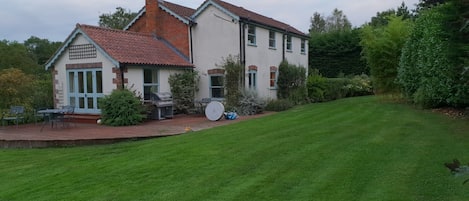 Rear of garden showing BBQ terrace