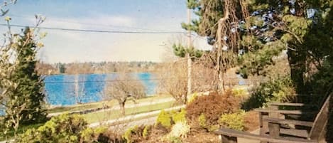 View of the lake from your private patio, perched above East Green Lake Way 