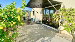 South Casita entrance, private patio with outdoor grill and dining area.