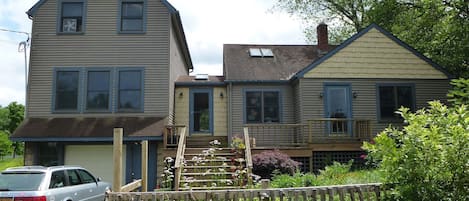 Front of house with seasonal cottage garden