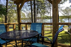 Enjoy a meal or drinks on the front deck with views of beautiful Lake Hawkins!