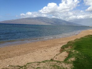 Beach is out front! Cross the big lawn past the pool and you're there in aMINUTE