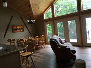 Dining room / Living room area looking out to lake.