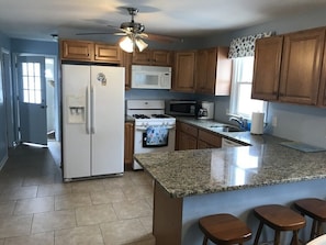 There's plenty of room for more than one cook in this well-appointed kitchen.