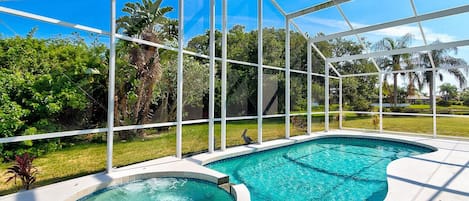 Hot tub and pool with private preserve and lake view