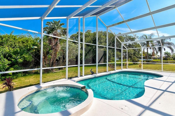 Hot tub and pool with private preserve and lake view