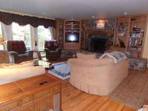 Our Cabin Themed Living Room with beautiful rock fireplace!