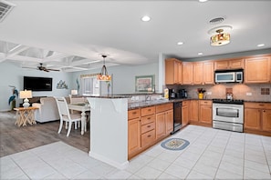 Open concept kitchen, dining room and living room