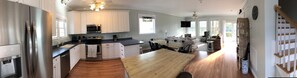 Panoramic view of the 1st floor kitchen and living area