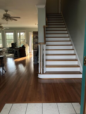 Entrance into the house and staircase up to the 2nd floor.