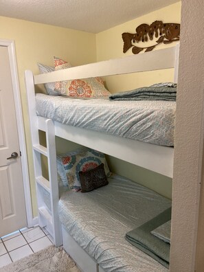 Bunk beds with brand new mattresses and comforters. Storage drawers underneath.