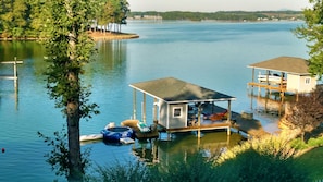 Dock includes one covered slip and mooring for 2 additional boats