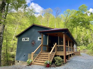 Whispering Waterfalls! A beautiful covered porch with 2 entrances…Welcome home!