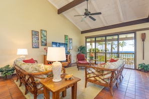 Large ocean view living area with high ceilings 