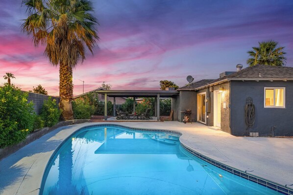 Beautiful new backyard remodel with patio and new pool decking!