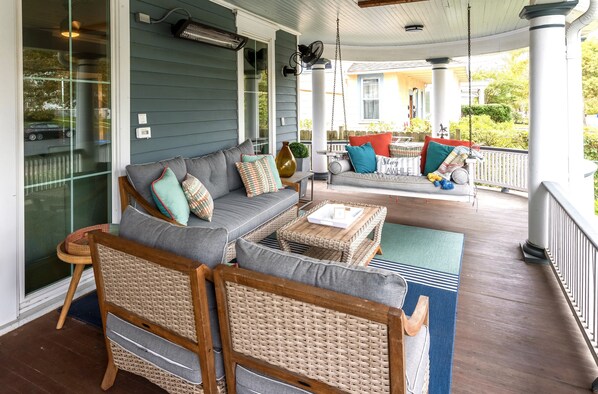 Porch swing; ultimate relaxation. Take the chill off with the heater. 