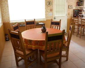 The separate dining nook has ample seating with a view of the horse paddock.