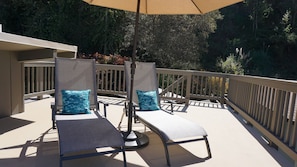 Sundeck looking towards backyard and hill
