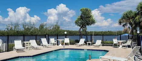 Heated Pool and pool deck overlooking Lemon Bay. Newly renovated in 2023! 