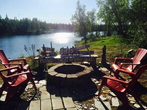 Fire Pit and Lake from the back of the Cabin. (We do not provide wood)