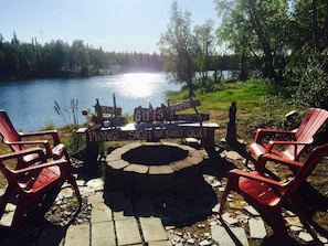Fire Pit and Lake from the back of the Cabin. (We do not provide wood)