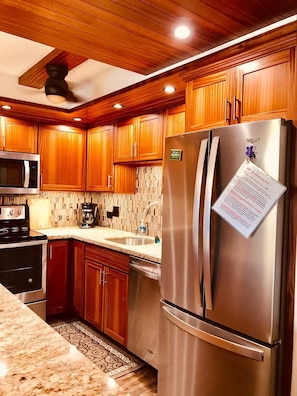 Beautifully updated kitchen with custom cabinets 