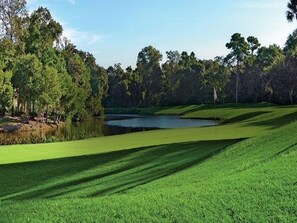 Condo is located steps from golf course