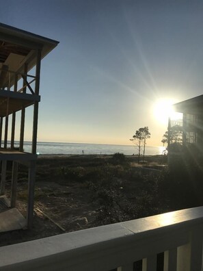 Sunset in December 2021 taken from front porch of Pelican Pass.